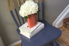 17 a gilded and navy color block chair looks much more modern and bold with this technique