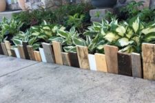 17 simple and catchy garden bed edging done with mismatching woodne planks in various colors