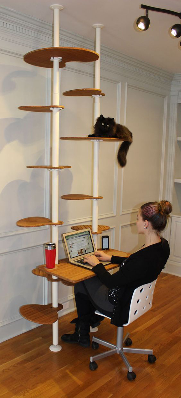 a modern cat tree built of metal pipes and wooden platforms - or you may use cutting boards for the kitty