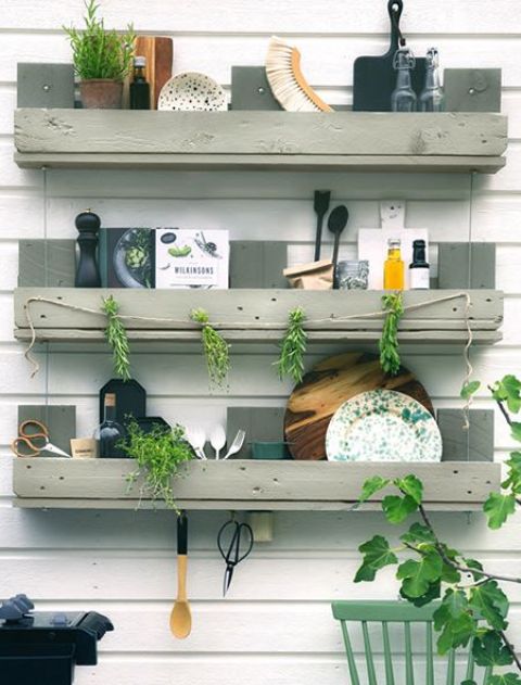 a trio of simple shelves in the kitchen to store eveyrthing you may need, hang stuff and even add greenery - built of pallet wood painted grey