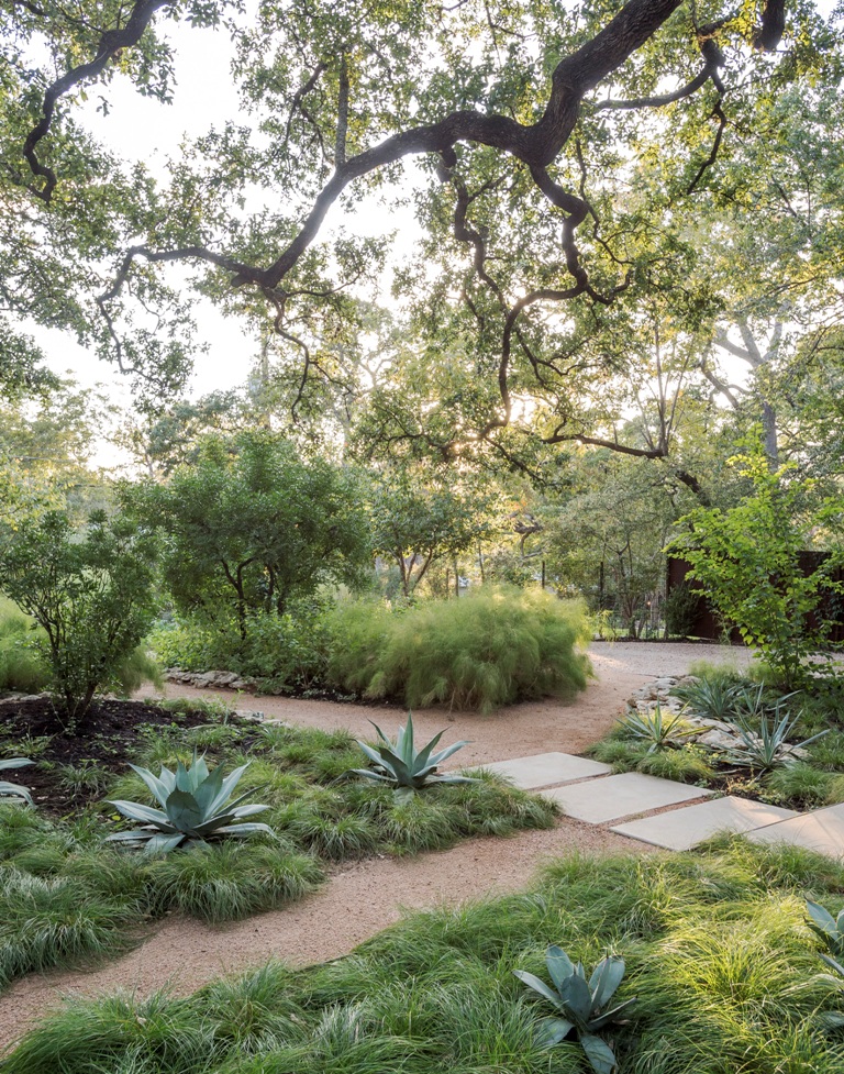 garden pathways done with decomposed granite and some large tiles in the same neutral shade