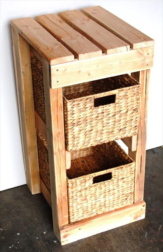 a large storage piece built of pallet wood and of basket boxes that act as drawers is a cool idea
