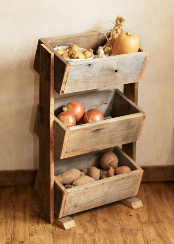 a simple rustic vegetable bin with three boxes on stands is a great idea for kitchens, you can easily build it of pallet wood