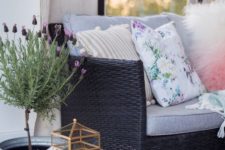 26 a candle lantern and potted blooms make this space more welcoming and hygge-like