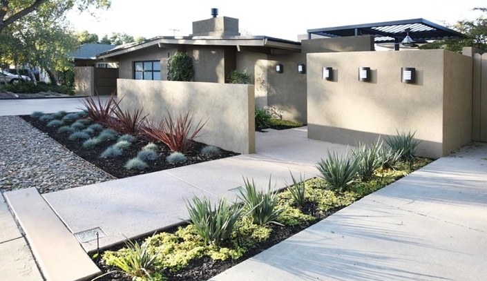 bold burgundy and usual green and pale green plants give the front yard variety without usign blooms