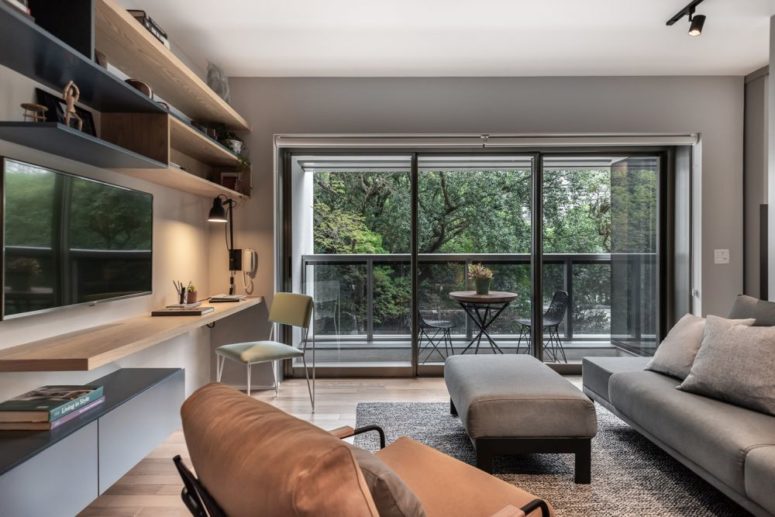 This contemporary apartment is only 50 square meters, and the designers used many cool features and clever furniture to make it work This contemporary apartment is only 50 square meters, and the designers used many cool features and clever furniture to make it work