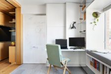 03 The work station in the living room can be hidden anytime for more functionality of the space