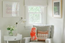 04 a cozy reading nook with a traditional feel and a small window with Roman shades in neutrals