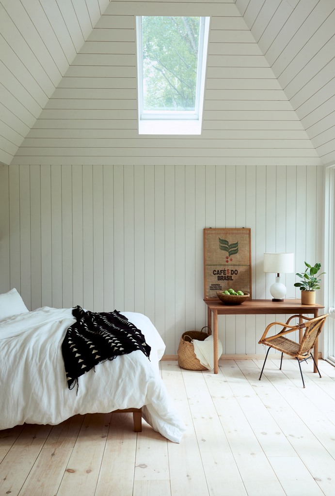 The bedroom is done with skylights, wooden furniture, wicker touches and potted greenery there are no unnecessary items The bedroom is done with skylights, wooden furniture, wicker touches and potted greenery- there are no unnecessary items
