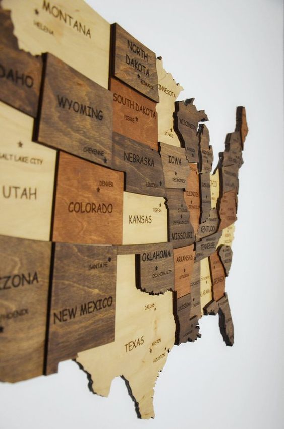 a wooden map is a gorgeous wall art, make each piece of a different shade to make it more contrasting and bold