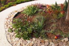 08 a gabion garden wall edging works as a retaining wall holding plants and soil, not only catchy edging