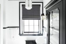 09 a bold monochromatic bathroom with printed Roman shades that add interest to the space