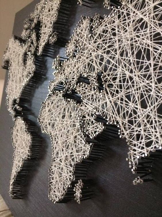 a wolrd map in string art is a difficult project but a fantastic decor piece, which is very trendy at the same time