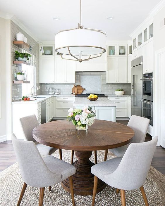 upholstered chairs in the dining space will add a homey and inviting feel to the space, too