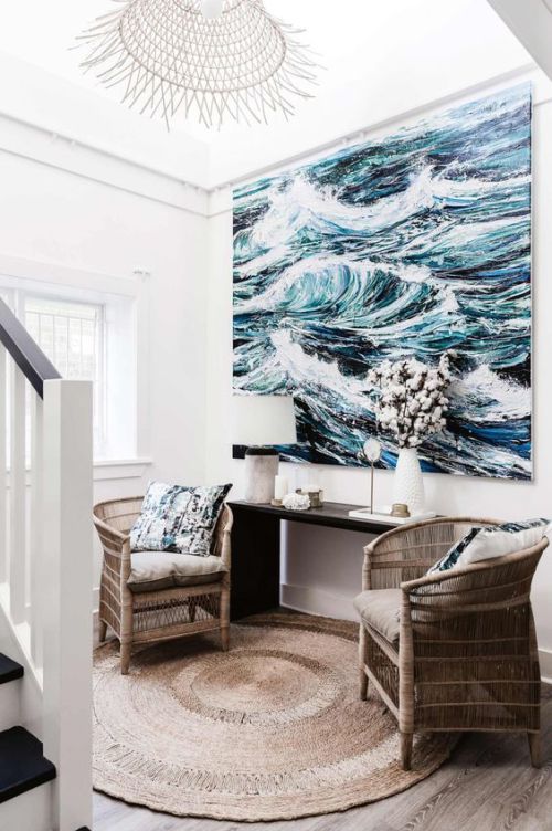 a coastal nook with rattan chairs - rattan screams beach and coastal holidays at once