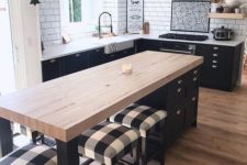 19 a farmhouse kitchen in black and white with buffalo check printed stools