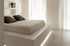 21 a floating bed highlighted with strip lighting is a chic contemporary idea and a cool way to add an edge to the bedroom