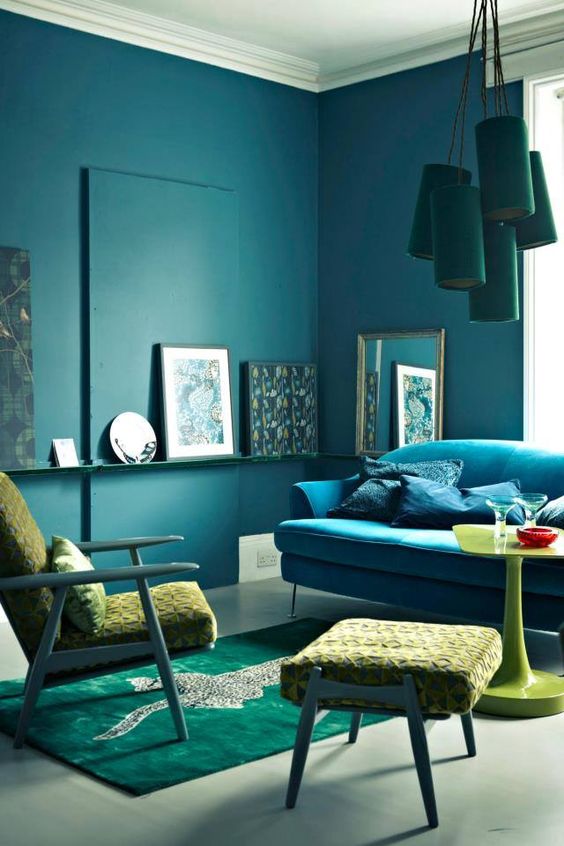 an analogous color scheme in the living room - dark green, turquoise and neon yellow