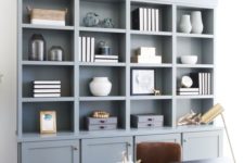 22 a slate blue shelf and storage unit is a great idea to add a touch of subtle color and give you storage space