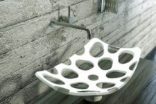 a white and sheer spotted vessel sink with a catchy shape will spruce up your bathroom even more