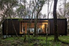 01 This remote prefab cabin is placed in Brazilian forest and its exterior is done to merge with the surroundings