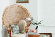 03 a peacock chair styled with faux fur, a pillow and a coral upholstered stool plus a side table create a gorgeous rest nook
