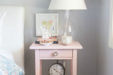 05 an IKEA Hemnes bedside table hacked in pink and with a metallic knob will add a girlish feel to the space
