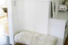 06 a comfy furry ottoman made of a bench and an IKEA faux fur rug in white