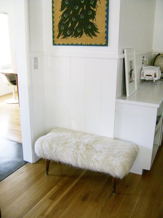 a comfy furry ottoman made of a bench and an IKEA faux fur rug in white