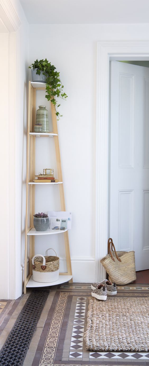 https://www.digsdigs.com/photos/2019/05/11-this-stylish-corner-shelf-is-great-for-the-hallway-keeping-all-those-essentials-ready-anytime-you-need-them.jpg