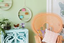12 a bright orange peacock chair, a light blue cabinet will make your boho space very colorful and bright