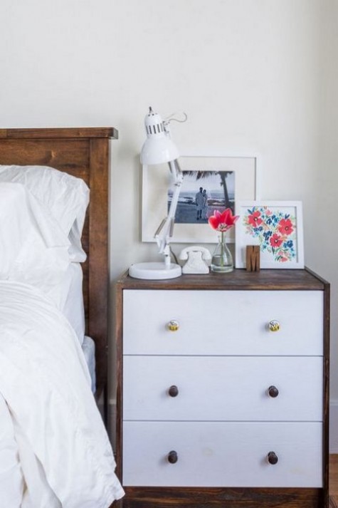 a stylish IKEA Rast hack – rich stained wood covering it and chic knobs for a bold nightstand