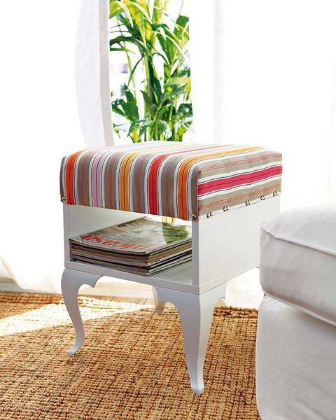 a vintage ottoman with storage made of an IKEA Trollsta side table and bright striped fabric
