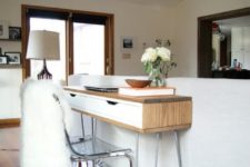 21 a slim mid-century modern desk of an IKEA Alex Ekby shelf, with a wooden cover and hairpin legs will fit a tiny space