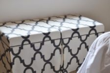 25 IKEA Lack coffee tables with printed black and white fabric slipcovers is a stylish idea for an ottoman