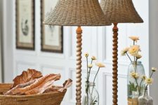 25 vintage-inspired table lamps with carved wooden legs and wicker lampshades will bring that vintage beach cottage esthetics
