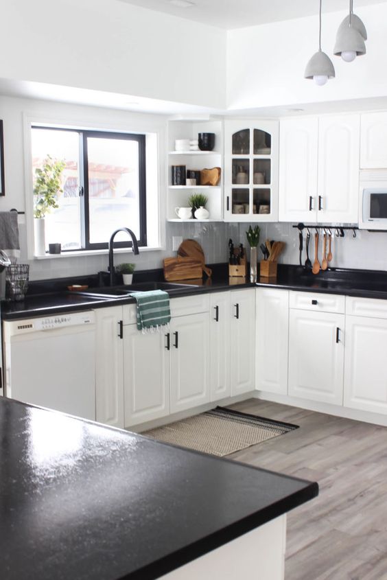 White cupboards shop and black countertops