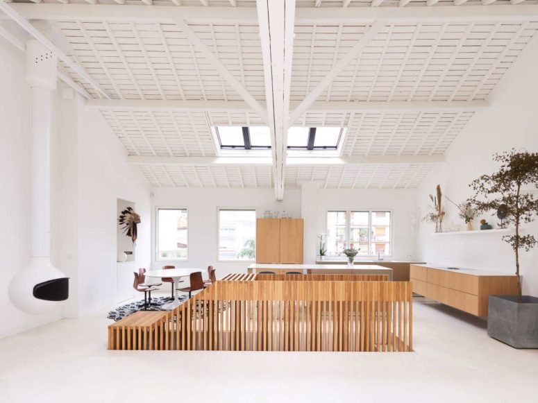 gorgeous penthouse open layout design This is the upper storey of the penthouse that embraces the white roof with beams and features an open layout