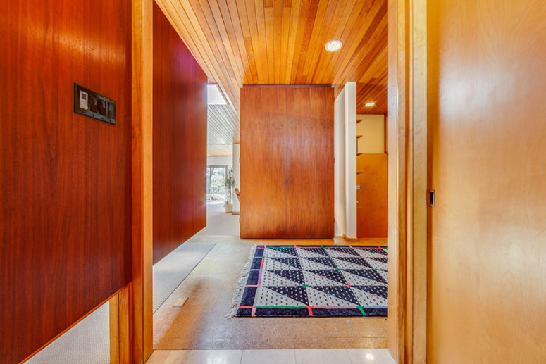 Cognac toned and honey toned wood is the key element of this home design and these two fill the spaces with warmth Cognac-toned and honey-toned wood is the key element of this home design and these two fill the spaces with warmth