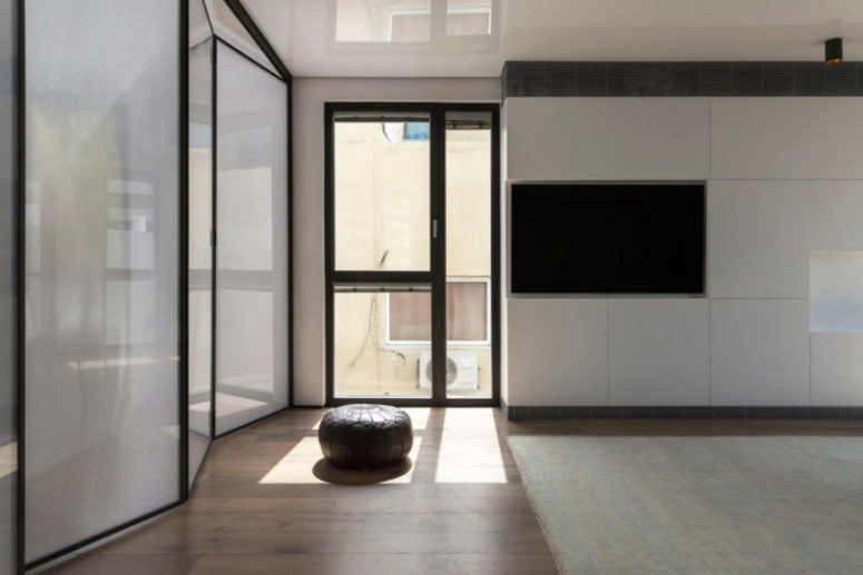 Floor to ceiling windows flood the space with natural light and let the owner enjoy the views