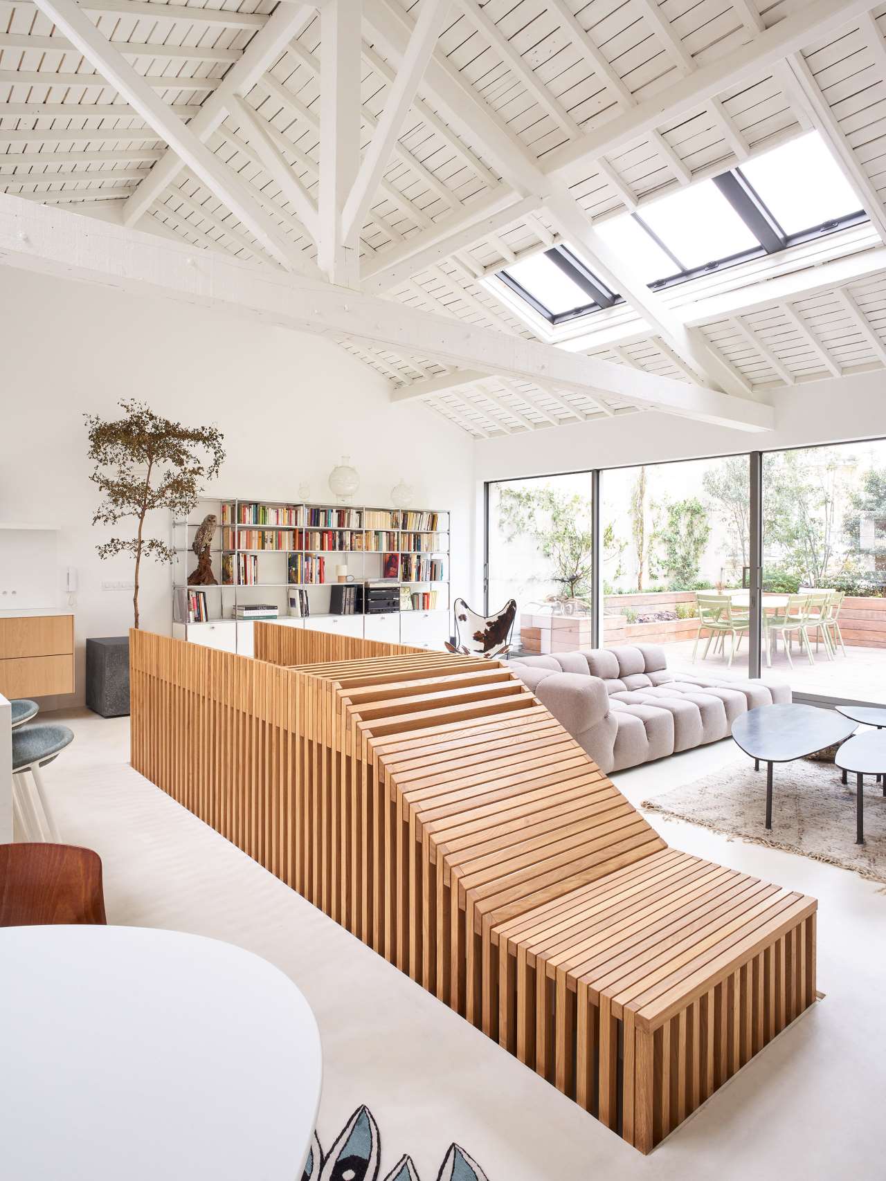 Skylights and an entrance to the terrace bring much natural light to the space