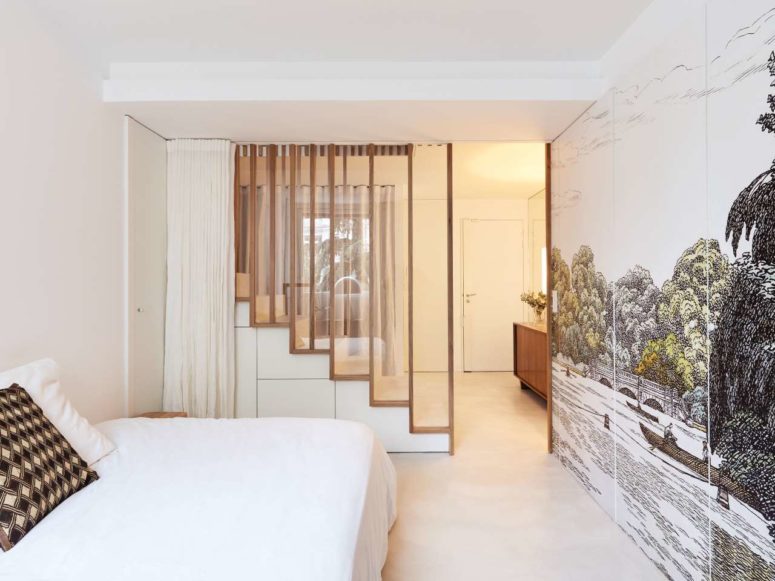 The lower storey features more personal spaces like bedrooms and bathrooms and a glass and wooden screen to separate the staircase The lower storey features more personal spaces like bedrooms and bathrooms and a glass and wooden screen to separate the staircase