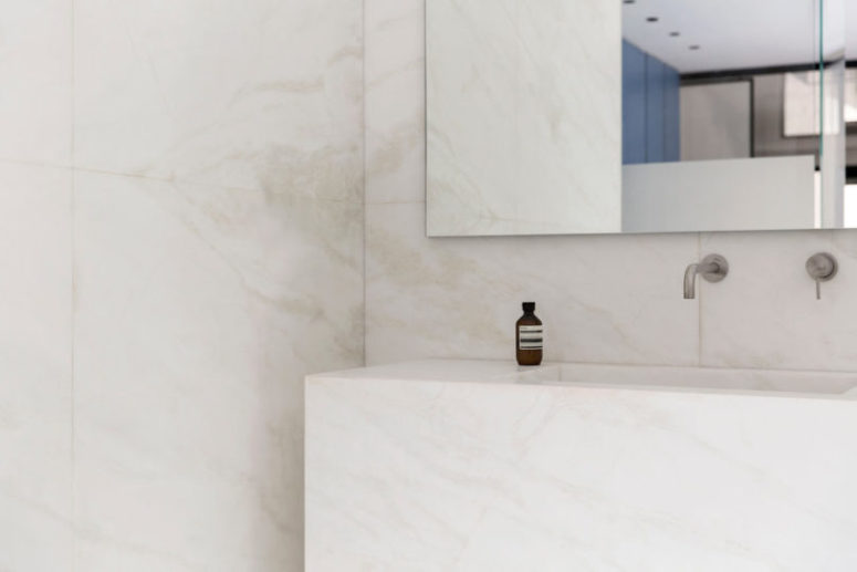The sink is also cutout of a large piece of marble