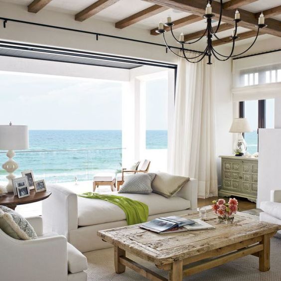 a neutral backless sofa is placed strategically not to prevent the owners from the views