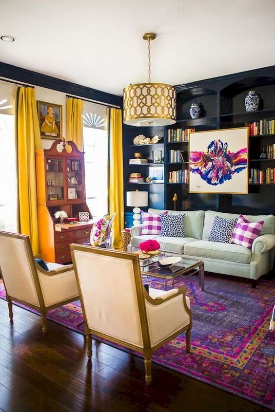 a-moody-yet-bright-eclectic-living-room-with-dakr-walls-yellow-curtains-printed-pillows-and-a-boho-rug-plus-a-vintage-buffet.jpg