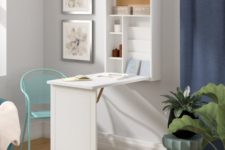 a simple white Murphy desk with enough storage space and a comfy working desktop to go for