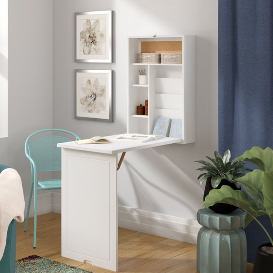 a simple white Murphy desk with enough storage space and a comfy working desktop to go for