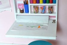 a small and minimal kid’s Murphy desk done in white will become a cool yet small art center that won’t take much space