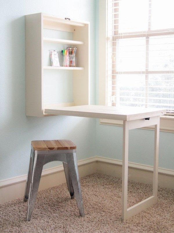 such a Murphy desk can be easily DIYed, it features much storage space and a large desk, which is enough for crafting, too