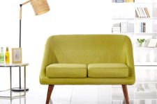 02 a bright mustard loveseat on wooden legs is a great statement furniture piece for a mid-century modern room